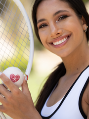 The cutest tennis balls ever. The pressured white balls are handmade in Bath, England (where Adeline the designer was actually born) - and bear the LOVE LOVE TENNIS trademark Heart + Rackets Logo.